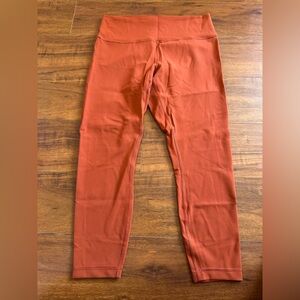 Women’s Lululemon Orange Wunder Train Leggings in 28’. Size 14. Worn once.